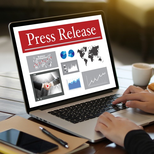 Press Release Concept, Thoughtful Male Person Looking Computer